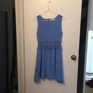 Blue dress with lace at the waist
